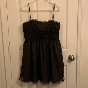 Mylie Cyrus/ Max Azria black and gold party dress